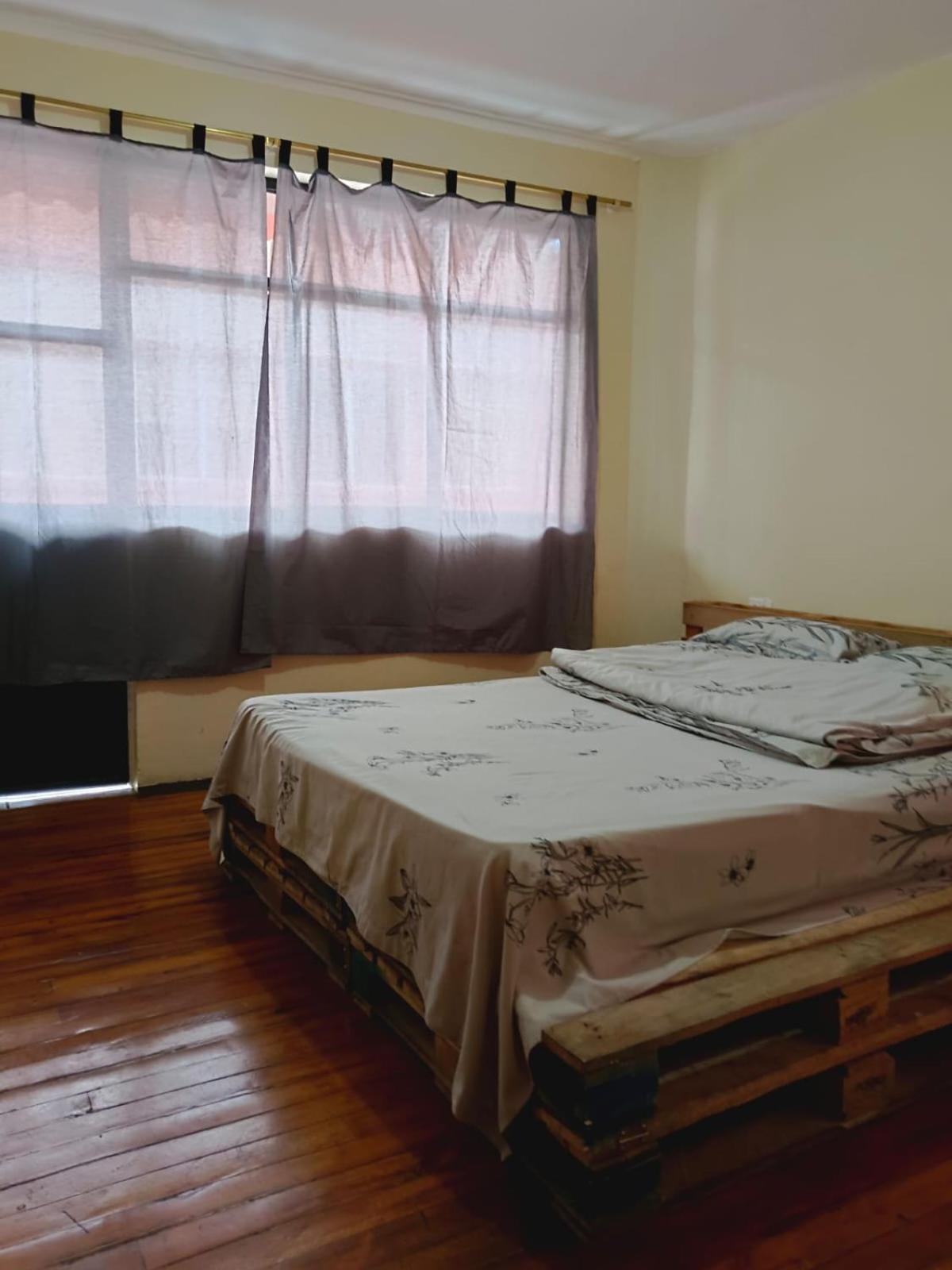 Albergue Camry Backpackers佳美背包客旅馆 กูเอ็งกา ภายนอก รูปภาพ